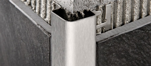 Mensola Angolare Schluter Per Pareti Piastrellate - Design Curvo, Alluminio, Finitura Grigio Pietra, Linguette Di Ancoraggio 3/32"